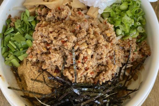 Josui Mazesoba. Stir fried Taiwanese minced beef with specialty made sauce, garlic, chili pepper, green onions, seaweed, fish powder, and bamboo.