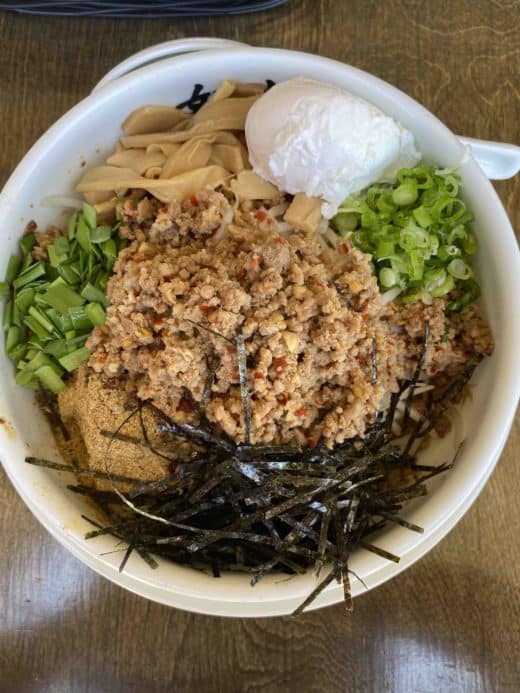 Josui Mazesoba. Stir fried Taiwanese minced beef with specialty made sauce, garlic, chili pepper, green onions, seaweed, fish powder, and bamboo.